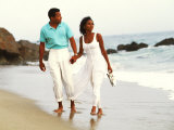 Black Couple Walking Together on the Beach