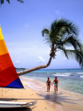 Couple on Beach with Sailboat and Palm Tree  Barbados