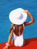Young Woman in Swimsuit with Wide-Brimmed Hat