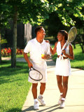 African American Couple Walking Together after Tennis Match