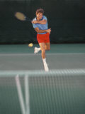 Man Hitting Tennis Ball