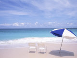 Lounge Chairs and Umbrella on the Beach