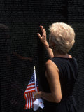 Woman at Vietnam Memorial  Washington DC  USA