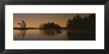 Silhouette of a Person in a Canoe on a Lake  Kejimkujik Lake  Nova Scotia  Canada