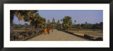Two Monks Walking in Front of an Old Temple  Angkor Wat  Siem Reap  Cambodia