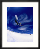 Snowboarder Doing a Trick in Midair