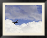 Commercial airplane soaring above the clouds