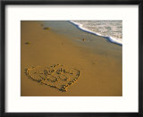Heart and "Love You" Carved Into Beach Sand with Tid