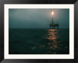 Night view of a plume of fire from an offshore oil rig in this Norwegian oil field