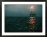 Night view of a plume of fire from an offshore oil rig in this Norwegian oil field