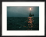 Night view of a plume of fire from an offshore oil rig in this Norwegian oil field