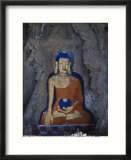 A painted stone Buddha near Lhasa  Tibet