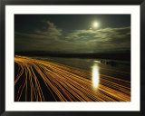 Time lapse of lights from boats moving on water