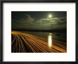 Time lapse of lights from boats moving on water