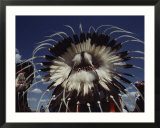 View from Behind of Blood Indians Wearing Tribal Feather Headdresses