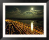 Time lapse of lights from boats moving on water