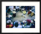 The Blur of a Frenzied Beat in a Circle of Spontaneous Drumming