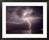 Dramatic Lightning Flashes Over Water