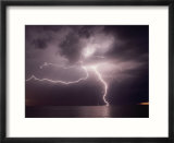 Dramatic Lightning Flashes Over Water