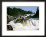 A rafter negotiates a large dip in the Magpie River in Quebec