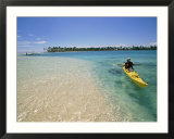A person goes kayaking in the sea
