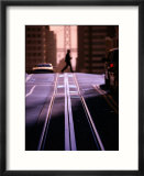 Pedestrian Crossing Cable Car Tracks on Nob Hill with Bay Bridge in Background  San Francisco  CA