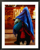 Maya woman praying in front of church altar  San Cristobel de Las Casas  Mexico