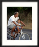Father and Son Riding a Bicycle  Papeete  French Polynesia