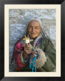 Tibetan Woman Holding Praying Wheel in Sakya Monastery  Tibet  China