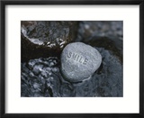 Rock with the Word Smile in Rushing Water