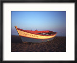 Colorful rowboat at sunset  Spain