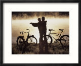Mature couple dancing near bicycles  CO