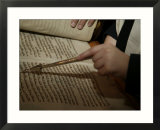 Boy reading from Torah at Bar Mitzvah