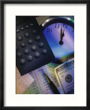 Calculator over clock  spread sheet and money