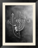 Football play on chalkboard