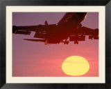 Airplane in Flight During Sunrise  Sunset