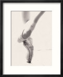 Close-up of ballerina's feet and legs