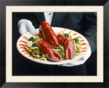 Waiter Serving Plate of Lobster