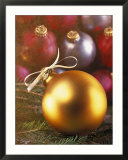 Gold Christmas ornament with white ribbon