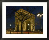 The famous Arc de Triomphe seen at night