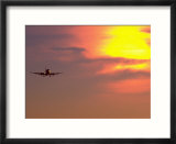 Commercial airplane at sunset