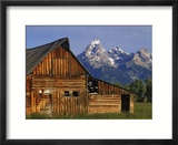Weathered Wooden Barn Along Mormon Row with the Grand Tetons in Distance  Grand Teton National Park
