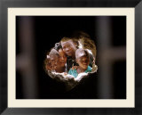 Young Nigerians Peer Through a Hole