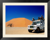 Men on Four Wheel Drive Vehicle at Dune 45 in Namib Nauklaft National Park  Sossusvlei  Namibia