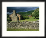 Storm Clouds Form Above Log Buildings on the Site of French Azilum
