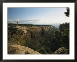 A man atop Red Rock Canyon Overlook in Colorado National Monument