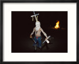 A White Mountain Apache dances by firelight in a puberty rites ceremony