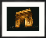 The Arc de Triomphe lit up at night