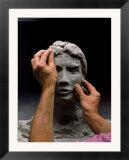 Hands creating sculpture