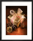 Christmas Gift with Gold Ribbon and Pinecones